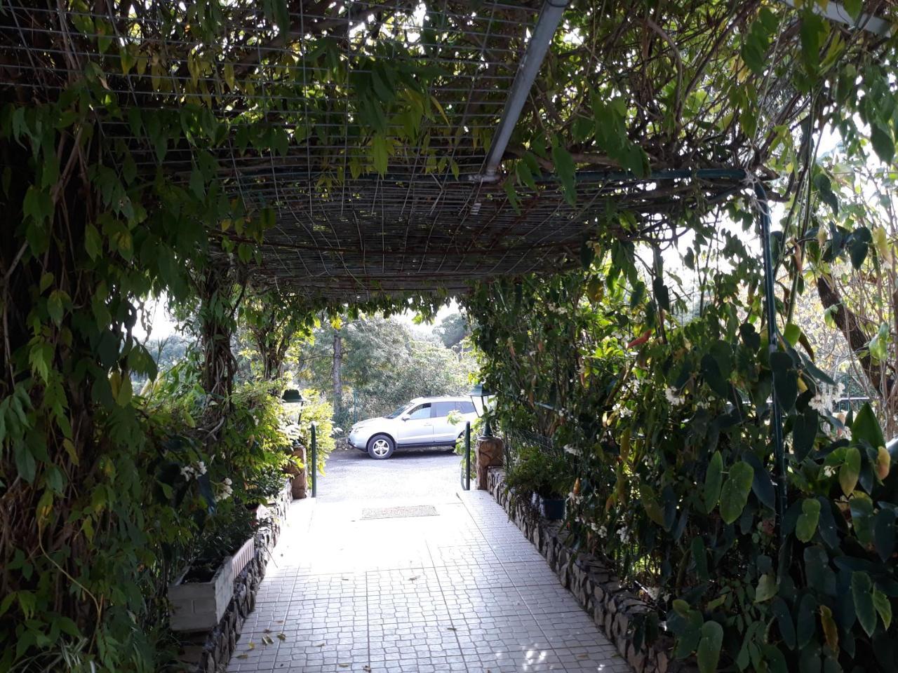 A Deolinda Guest House ซังติอาโก โด กาเซ็ง ภายนอก รูปภาพ